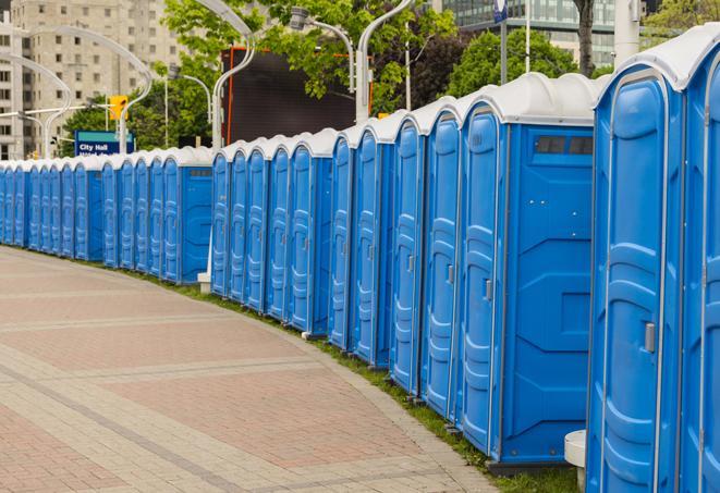 a row of portable restrooms at an outdoor special event, ready for use in Boulder Creek, CA